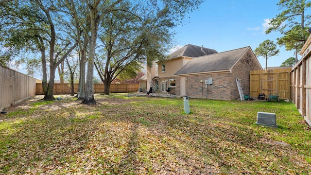 16902 River Willow Dr, Spring, TX 77379 - fenced backyard with a patio area