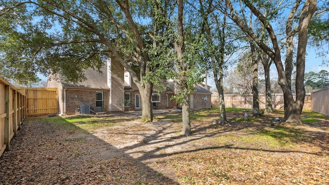 16902 River Willow Dr, Spring, TX 77379 - fenced backyard with central air condition unit