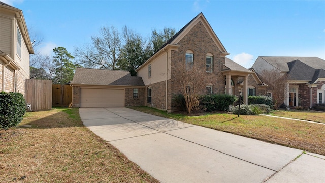 16902 River Willow Dr, Spring, TX 77379 - traditional-style house featuring brick siding, a garage, and concrete driveway