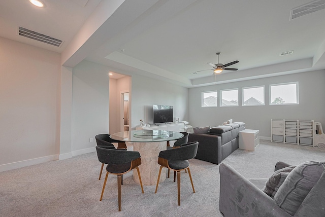27807 Bridgeway St, Spring, TX 77386 - living room with light colored carpet, ceiling fan, a raised ceiling, baseboards, and recessed lighting