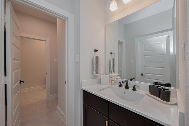 27807 Bridgeway St, Spring, TX 77386 - bathroom featuring tile patterned floors, vanity, and baseboards