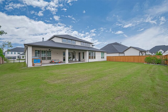 27807 Bridgeway St, Spring, TX 77386 - rear view of house featuring a ceiling fan and a patio