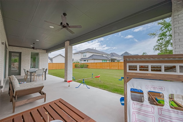 27807 Bridgeway St, Spring, TX 77386 - view of patio with outdoor dining area and ceiling fan