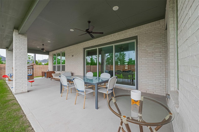 27807 Bridgeway St, Spring, TX 77386 - view of patio featuring outdoor dining area, ceiling fan, and fence
