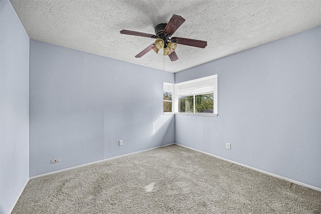 17607 Northfalk Dr, Houston, TX 77084 - spare room with a ceiling fan, carpet floors, a textured ceiling, baseboards, and a textured wall