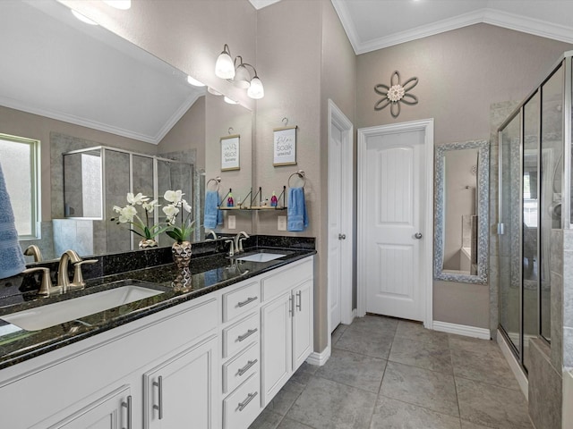 1326 Tee Time Ct, Crosby, TX 77532 - full bath featuring a shower stall, double vanity, ornamental molding, vaulted ceiling, and baseboards