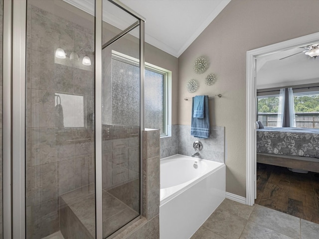 1326 Tee Time Ct, Crosby, TX 77532 - ensuite bathroom with ornamental molding, a garden tub, a stall shower, and vaulted ceiling