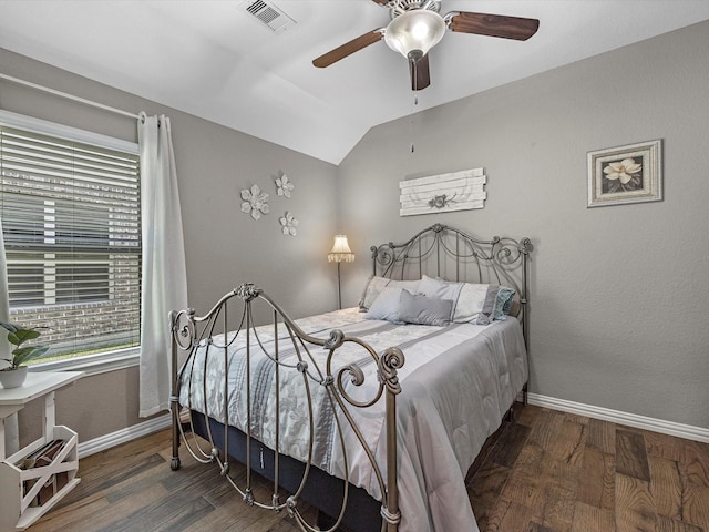 1326 Tee Time Ct, Crosby, TX 77532 - bedroom featuring baseboards, wood finished floors, vaulted ceiling, and ceiling fan