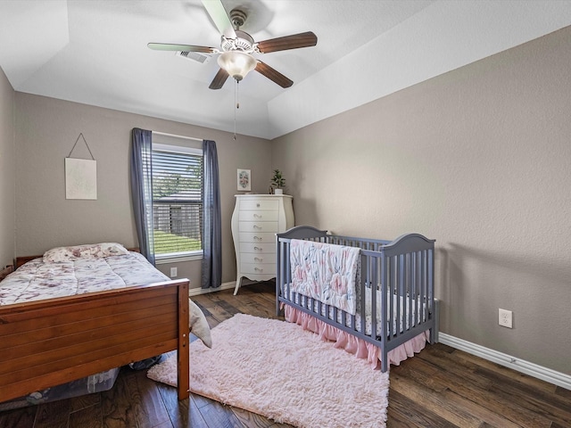 1326 Tee Time Ct, Crosby, TX 77532 - bedroom featuring wood finished floors, baseboards, a ceiling fan, and lofted ceiling