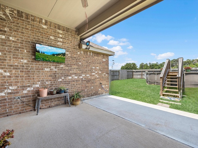 1326 Tee Time Ct, Crosby, TX 77532 - view of patio featuring a ceiling fan and stairs