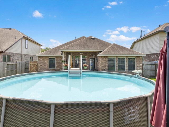 1326 Tee Time Ct, Crosby, TX 77532 - view of swimming pool featuring a fenced backyard