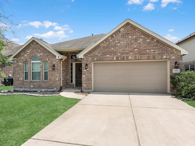 1326 Tee Time Ct, Crosby, TX 77532 - single story home featuring brick siding, an attached garage, driveway, a front lawn, and a shingled roof