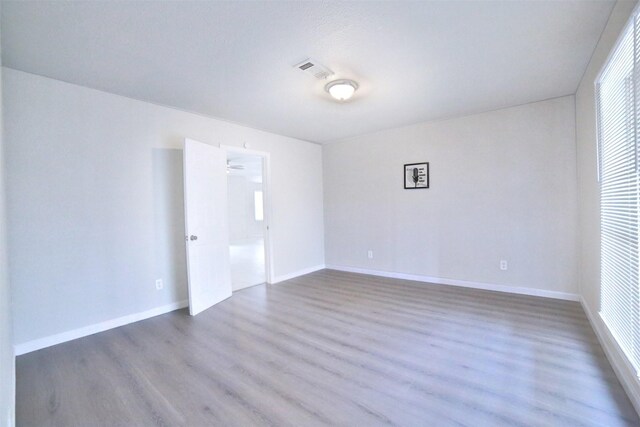 6534 Ledbetter St, Houston, TX 77087 - empty room with wood finished floors and baseboards