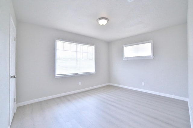 6534 Ledbetter St, Houston, TX 77087 - spare room with wood finished floors and baseboards