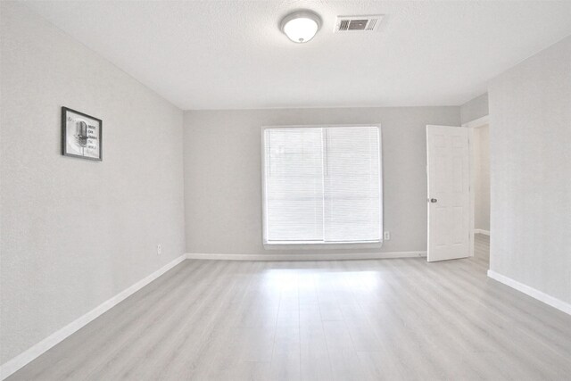 6534 Ledbetter St, Houston, TX 77087 - empty room featuring baseboards and wood finished floors