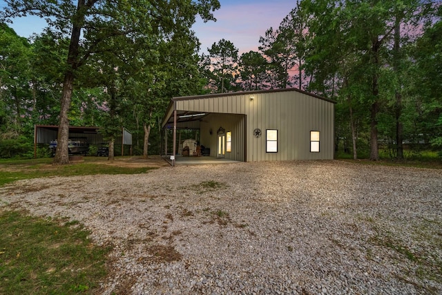 51 Roatan Dr, Point Blank, TX 77364 - outdoor structure at dusk with an outbuilding and an outdoor structure
