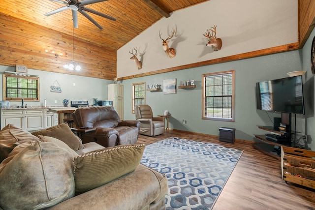 51 Roatan Dr, Point Blank, TX 77364 - living area featuring wooden ceiling, a ceiling fan, wood finished floors, high vaulted ceiling, and beamed ceiling