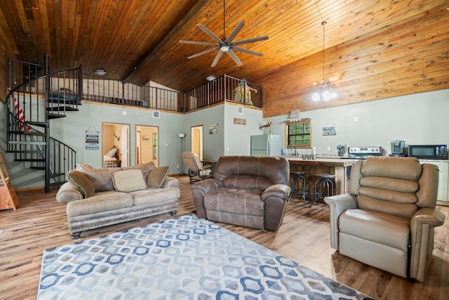 51 Roatan Dr, Point Blank, TX 77364 - living room with wood finished floors, stairs, ceiling fan, wooden ceiling, and high vaulted ceiling
