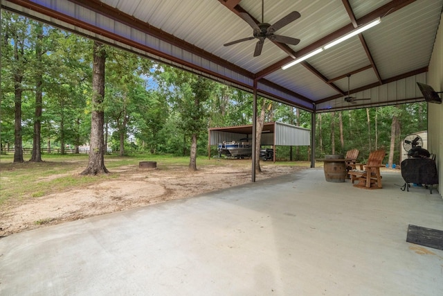 51 Roatan Dr, Point Blank, TX 77364 - view of patio featuring a ceiling fan, view of scattered trees, and a carport