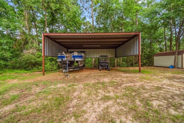 51 Roatan Dr, Point Blank, TX 77364 - view of yard with a detached carport, an outdoor structure, and driveway