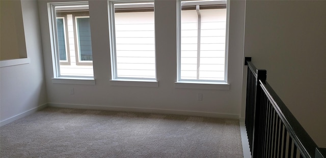 10611 Hidden Rock Dr, Missouri City, TX 77459 - empty room featuring carpet flooring and baseboards