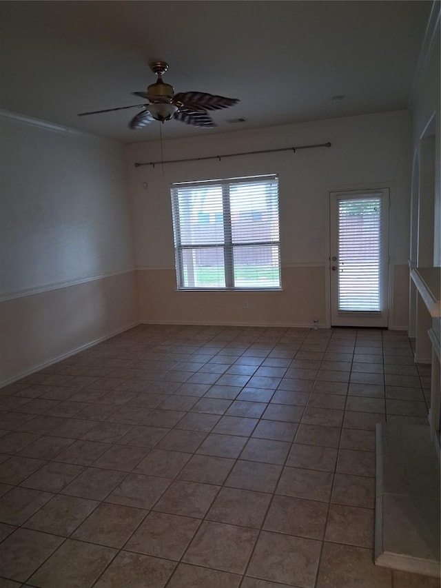 24911 Tribeca Ln, Katy, TX 77493 - spare room featuring plenty of natural light, light tile patterned floors, and ceiling fan