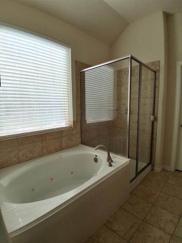 24911 Tribeca Ln, Katy, TX 77493 - full bath featuring tile patterned flooring, a shower stall, and a tub with jets