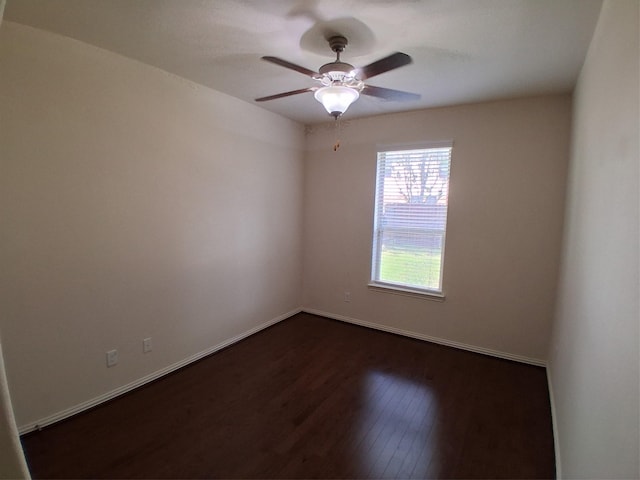 24911 Tribeca Ln, Katy, TX 77493 - unfurnished room featuring dark wood finished floors, baseboards, and ceiling fan