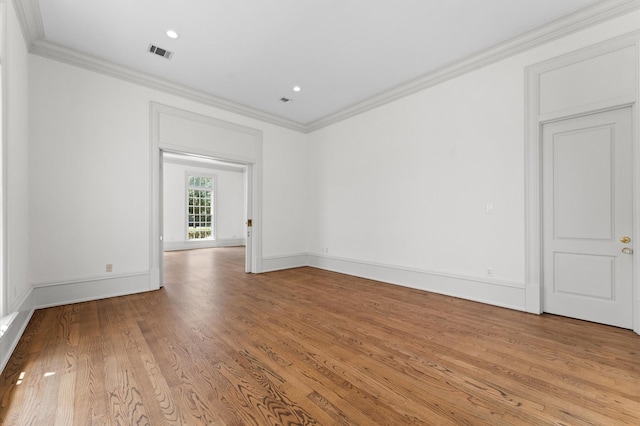 6104 San Felipe St, Houston, TX 77057 - unfurnished room with crown molding, light wood-style floors, baseboards, and recessed lighting