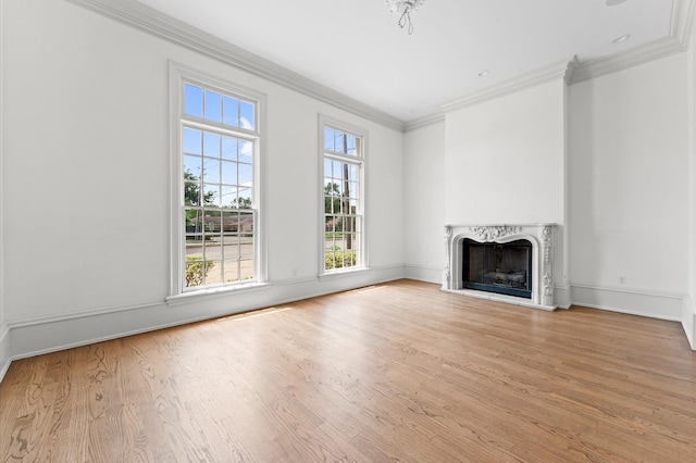 6104 San Felipe St, Houston, TX 77057 - unfurnished living room featuring ornamental molding, wood finished floors, a premium fireplace, and baseboards