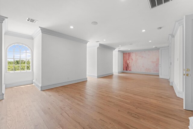 6104 San Felipe St, Houston, TX 77057 - unfurnished living room featuring ornamental molding, light wood finished floors, recessed lighting, and baseboards
