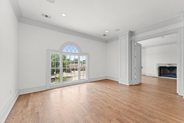 6104 San Felipe St, Houston, TX 77057 - unfurnished living room with crown molding, a fireplace, wood finished floors, baseboards, and recessed lighting
