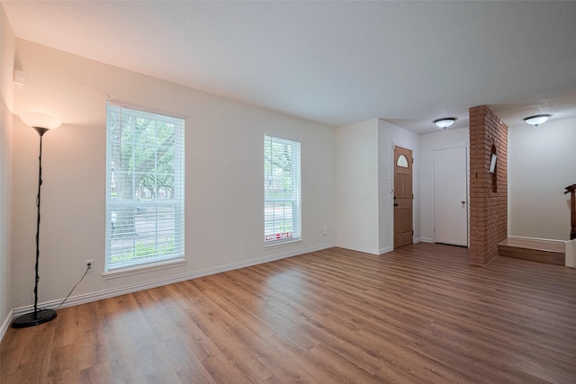 13040 Trail Hollow Dr Unit 3040, Houston, TX 77079 - unfurnished room with wood finished floors and baseboards
