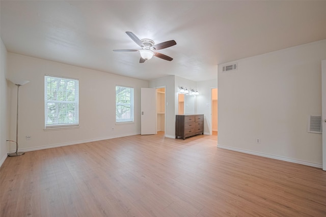 13040 Trail Hollow Dr Unit 3040, Houston, TX 77079 - spare room with a ceiling fan, light wood-style flooring, and baseboards