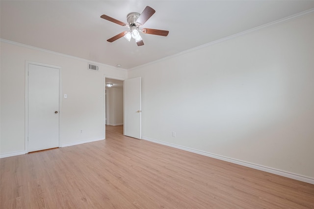 13040 Trail Hollow Dr Unit 3040, Houston, TX 77079 - spare room featuring light wood finished floors, ceiling fan, crown molding, and baseboards