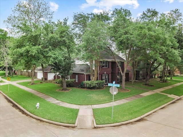 view of community featuring a yard
