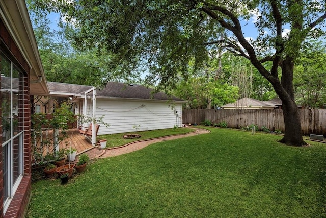 view of yard with a deck