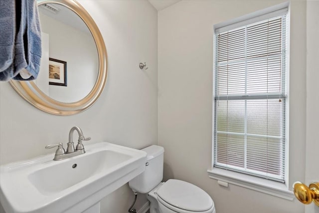 bathroom with a sink and toilet