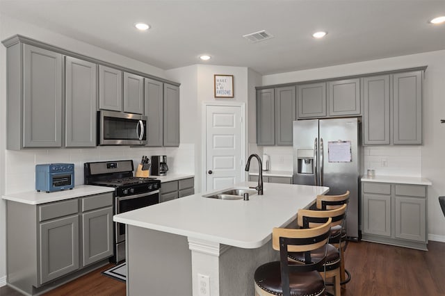 183 Lucky Manor Ln, La Porte, TX 77571 - kitchen with appliances with stainless steel finishes, gray cabinets, a sink, and recessed lighting
