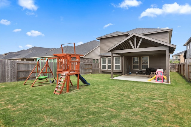 183 Lucky Manor Ln, La Porte, TX 77571 - back of house featuring a patio area, a playground, and roof with shingles