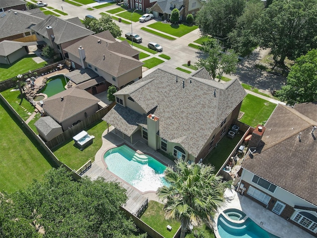 1409 Cherokee St, Deer Park, TX 77536 - aerial perspective of suburban area with a pool
