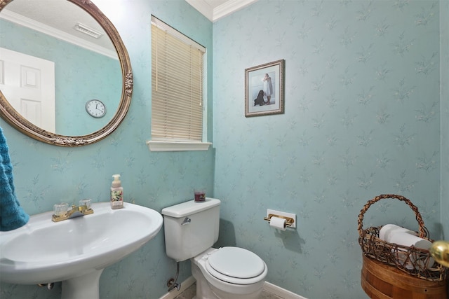 1409 Cherokee St, Deer Park, TX 77536 - half bath with a sink, toilet, ornamental molding, and baseboards