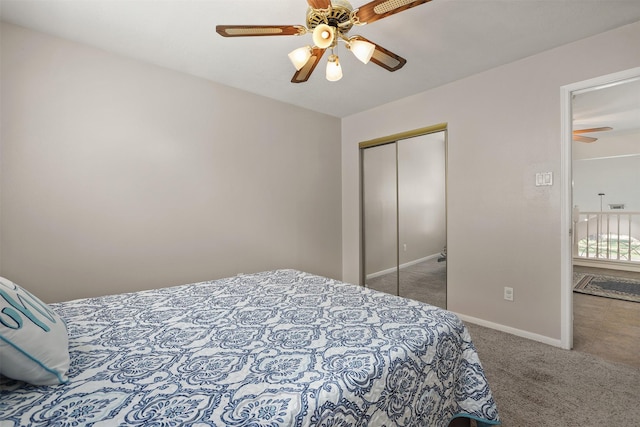 1409 Cherokee St, Deer Park, TX 77536 - carpeted bedroom featuring a closet, baseboards, and a ceiling fan