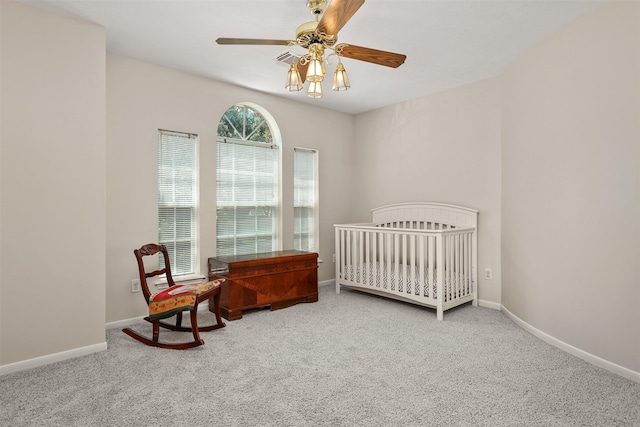 1409 Cherokee St, Deer Park, TX 77536 - bedroom with carpet, baseboards, and a ceiling fan
