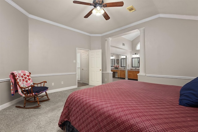 1409 Cherokee St, Deer Park, TX 77536 - carpeted bedroom with decorative columns, lofted ceiling, baseboards, ensuite bath, and ornamental molding