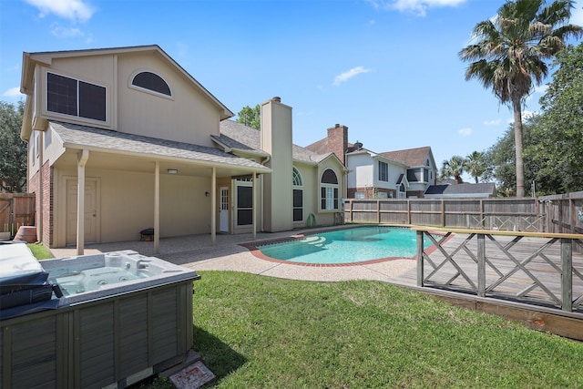 1409 Cherokee St, Deer Park, TX 77536 - view of pool with a hot tub and a patio area