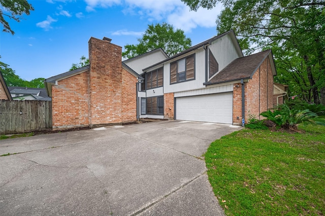 520 S Rivershire Dr, Conroe, TX 77304 - view of front facade with a chimney, driveway, fence, and a garage