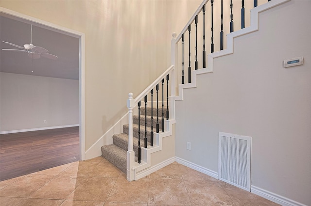 520 S Rivershire Dr, Conroe, TX 77304 - stairway with a ceiling fan and baseboards