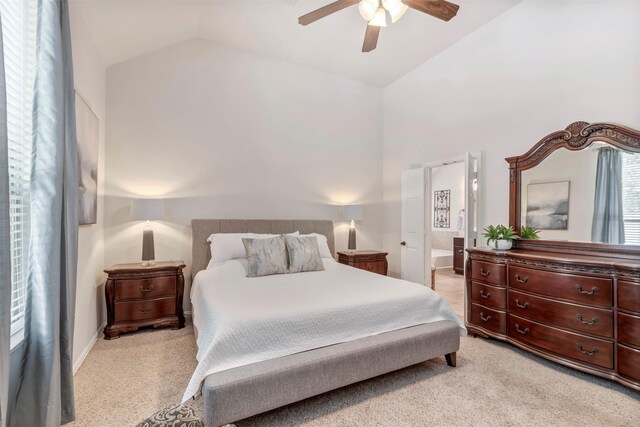 17219 Rookery Ct, Conroe, TX 77385 - bedroom with light colored carpet, high vaulted ceiling, and ceiling fan