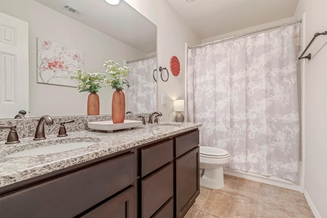 17219 Rookery Ct, Conroe, TX 77385 - full bath featuring toilet, double vanity, and shower / bathtub combination with curtain